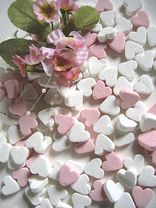 Corações dos doces rosa